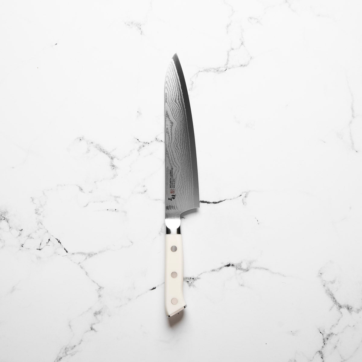 Mcusta Zanmai Corian Classic VG10 Damascus Gyuto 210mm - blade detail