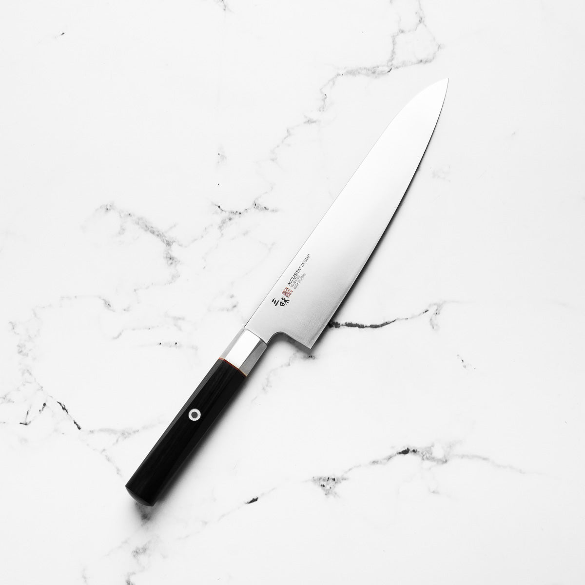 Mcusta Zanmai "Hybrid" VG10 Gyuto 240mm - angled view